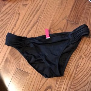 Black Victoria’s Secret bikini bottoms